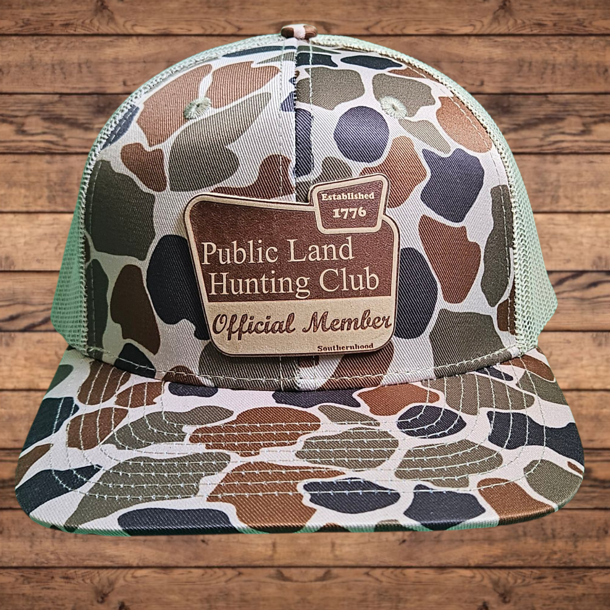 Leather Public Land Patch on Classic Duck Camo Hat.