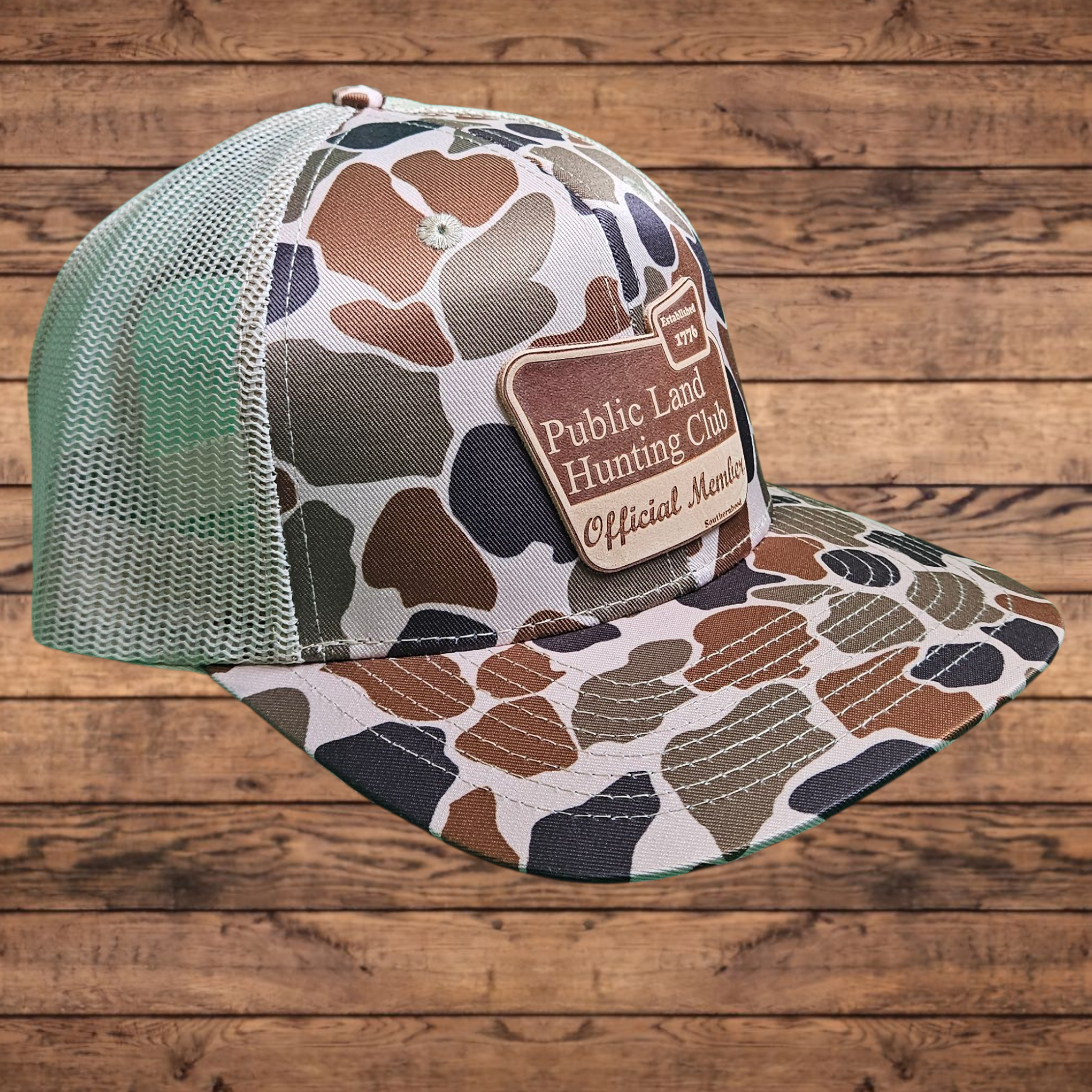 Leather Public Land Patch on Classic Duck Camo Hat.