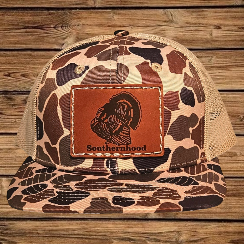 Leather Turkey Patch on Classic Duck Camo Hat.